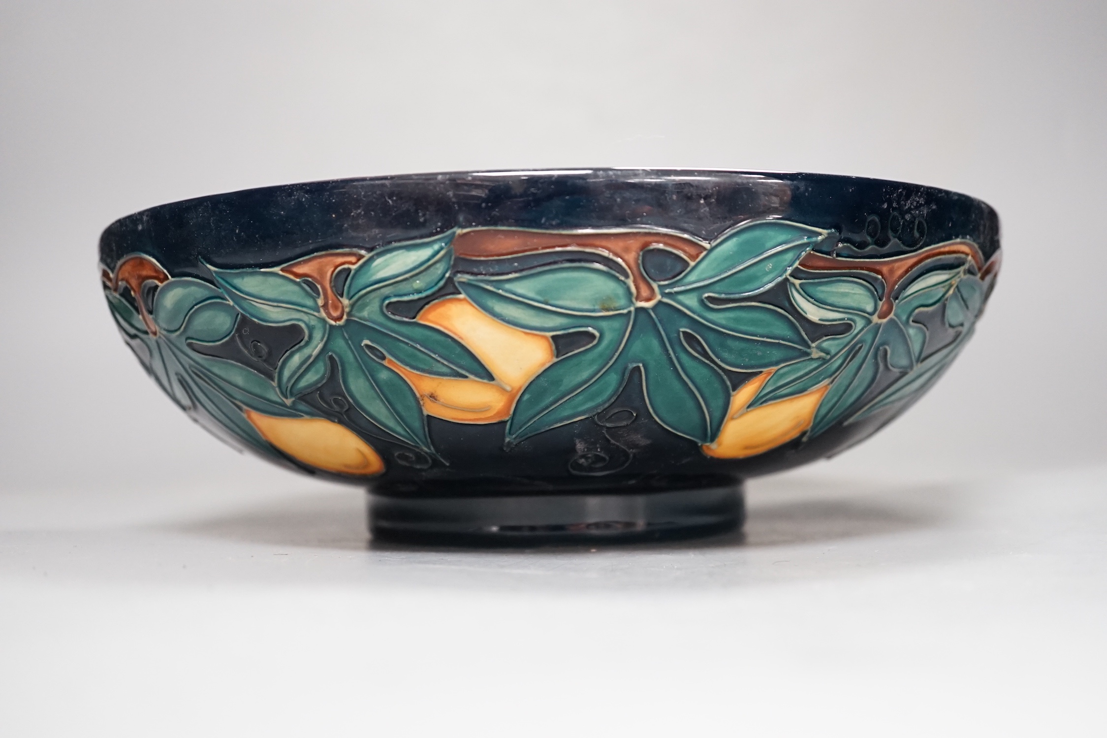 A Moorcroft Passion Flower fruit bowl - 26cm wide
